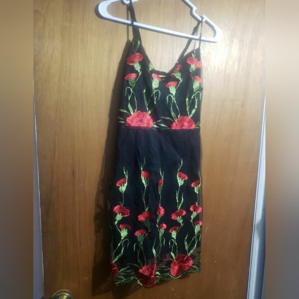 Iris black dress with adjustable straps. Size large